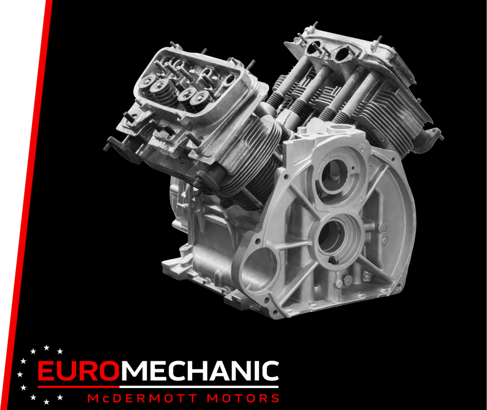 Black and white image of a complex engine component from Euromechanic McDermott Motors in North York, featuring visible pistons and gears against a black background with a bold red and white logo in the corner. EuroMechanic - McNally Auto | Top Reviewed Auto Repair Shop in North York | Visit EuroMechanic - McNally Auto